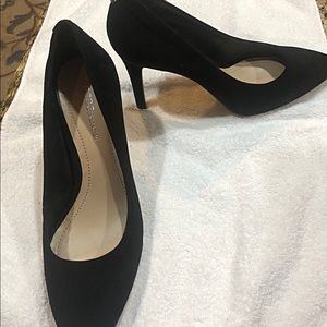 Black suede pumps